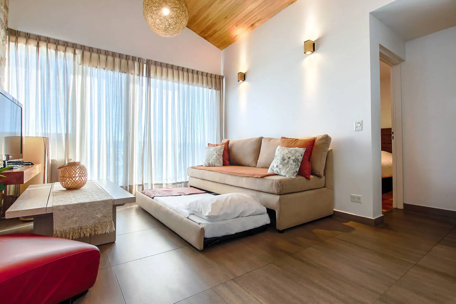 Living con sofá cama departamento Premium