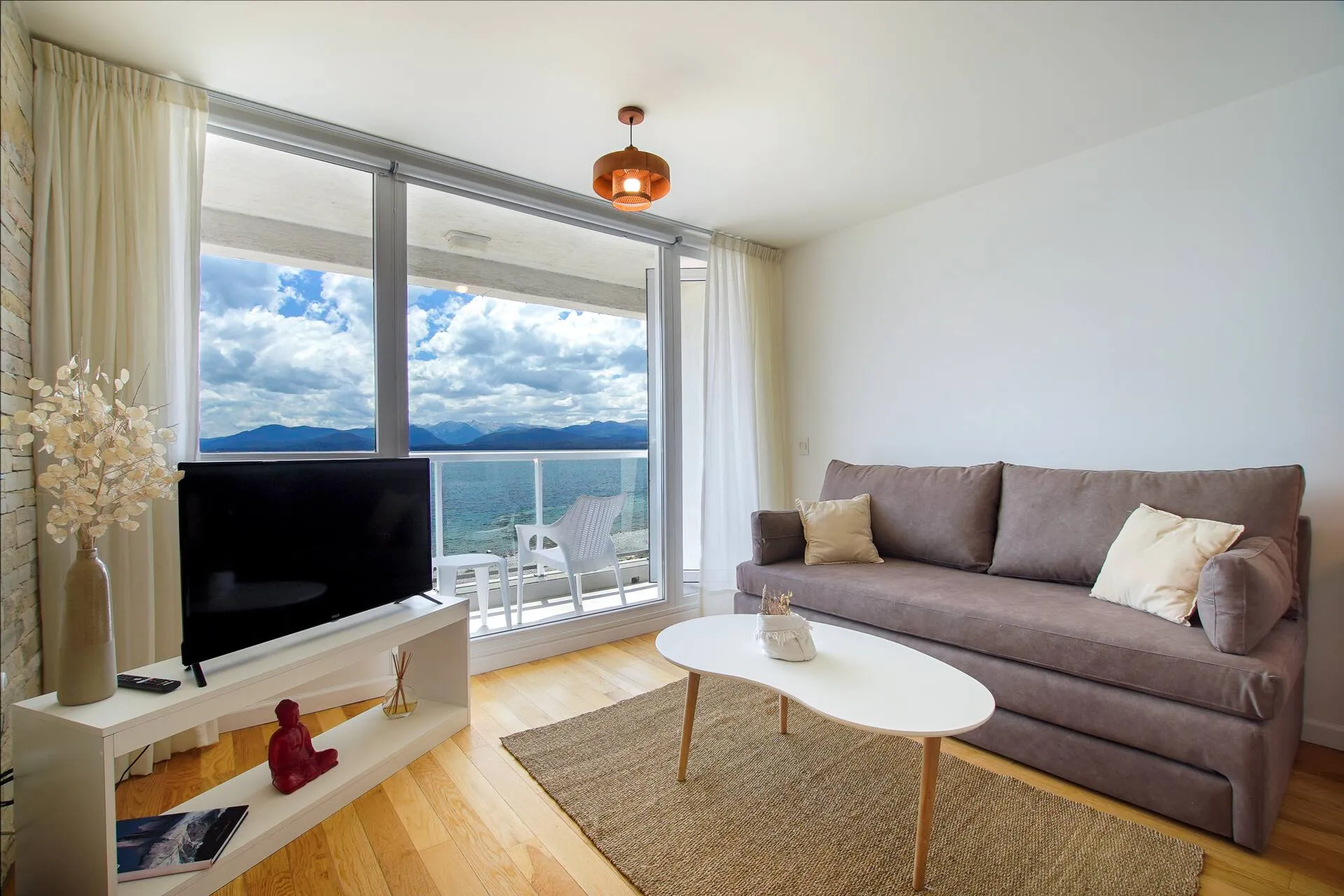 Sala de estar do apartamento ROMANCE